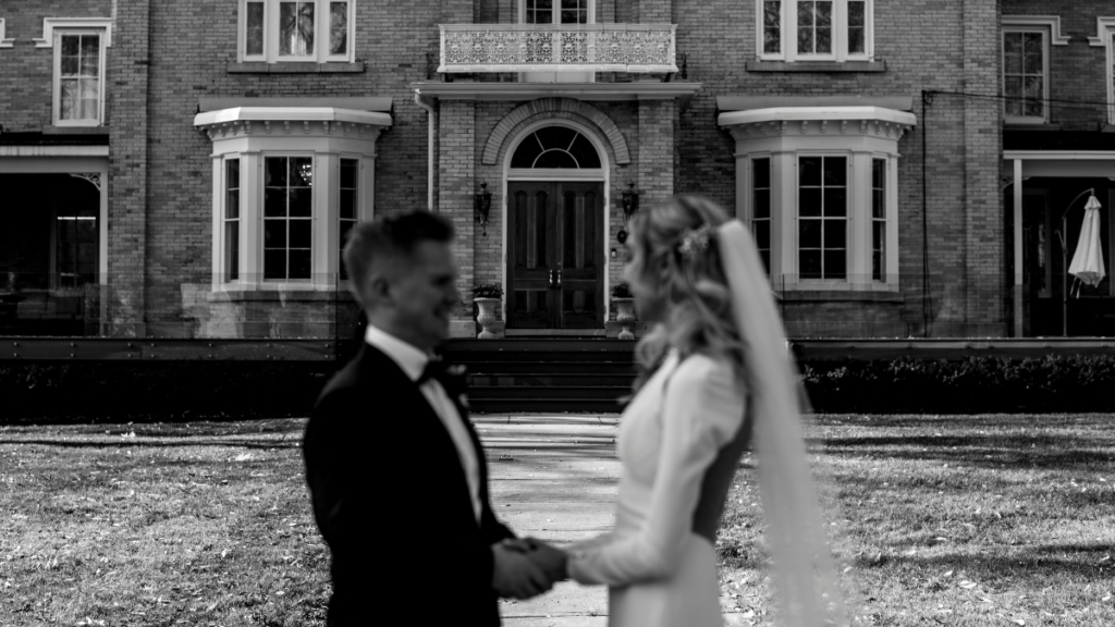 couple standing in front of the CAPE Picton