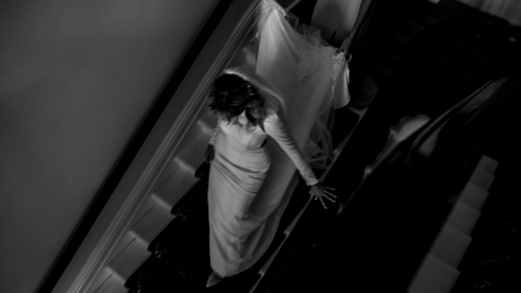 Bride walking down stairs at the CAPE Picton